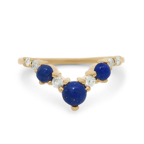 A lapis and white diamond band set in yellow gold.