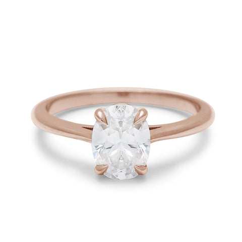 A solitaire brilliant cut oval 1.00ct lab white diamond set in rose gold., Rose Gold 4