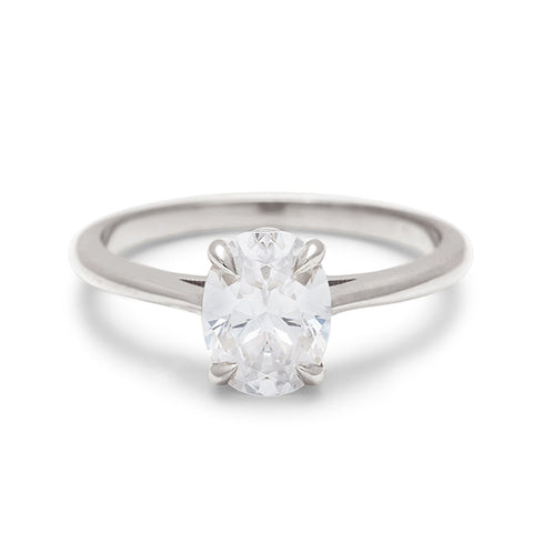 A solitaire brilliant cut oval 1.00ct lab white diamond set in white gold., White Gold