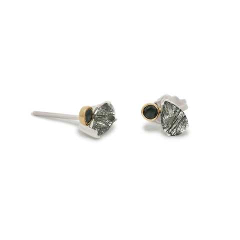 Pair of silver stud toi et moi earrings with black rutile quartz gemstones and round black diamonds on a white background 2