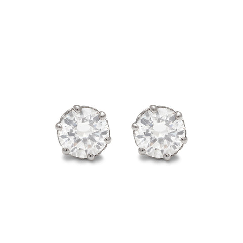 A pair of 1.25ct white diamond stud earrings set in an intricate basket in white gold., White Gold 7
