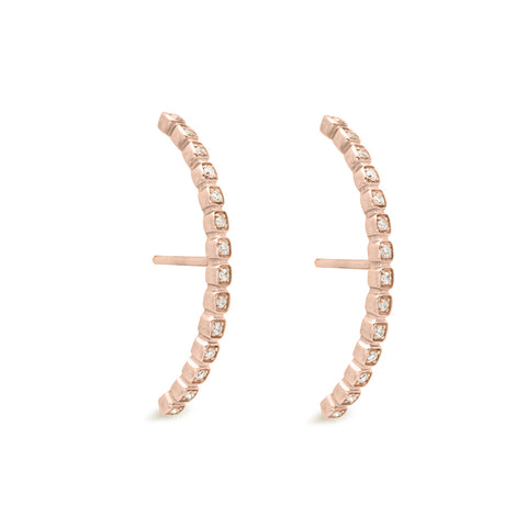 A pair of white diamond dusted curve earrings set in rose gold both earrings angled., Rose Gold 5