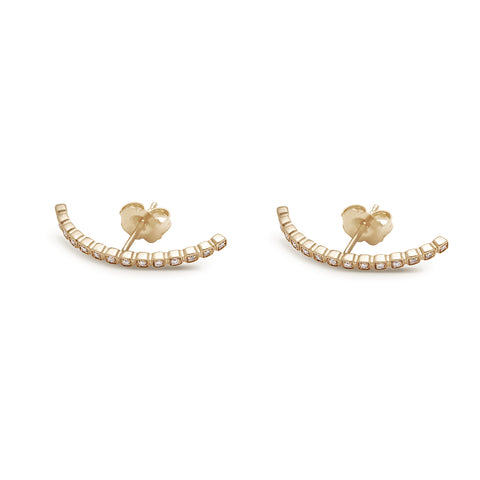 A pair of white diamond dusted curve earrings set in yellow gold both earrings on their side., Yellow Gold 4