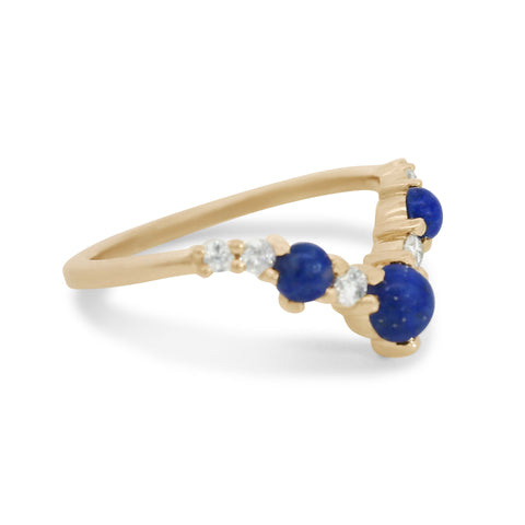 A lapis and white diamond band set in yellow gold. 2