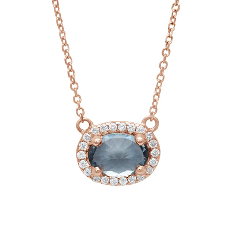 A necklace with an oval shape grey spinel center stone surrounded by a white diamond pave halo set in rose gold on a rose gold chain., Rose Gold 2