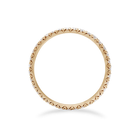 Side view of a yellow gold band with an eternity of round white diamond stones. 3
