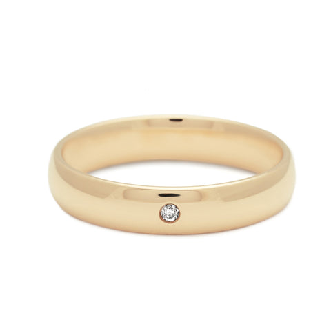 A 4mm classic round band with white diamond accent stone set in yellow gold., Yellow Gold