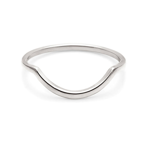 A curved solid gold band set in white gold., White Gold