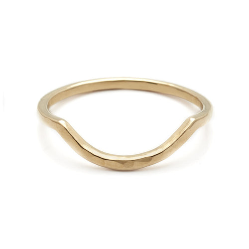 A curved solid hammered gold band set in yellow gold., Yellow Gold