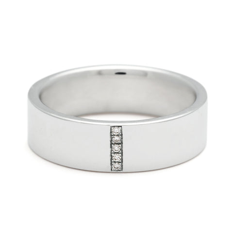 A flat band with a line of round white diamond set in white gold., White Gold