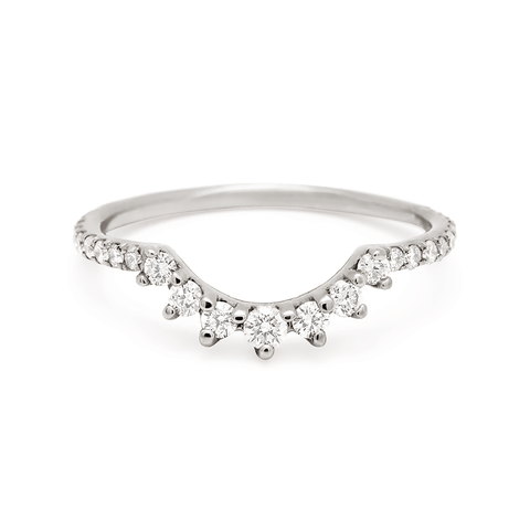 A curve band with 7 white diamonds at the center and white diamond pave around the rest of the band set in white gold., White Gold 5