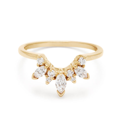 A band with three marquise shaped white diamonds with round white diamond set in yellow gold., Yellow Gold
