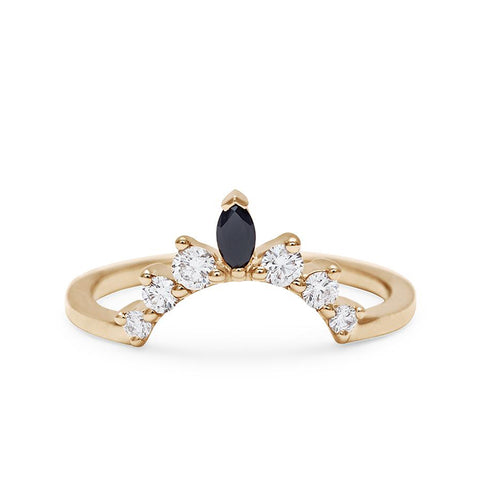 A curved band with three round white diamonds on either side of a marquise black diamond set in yellow gold., Yellow Gold