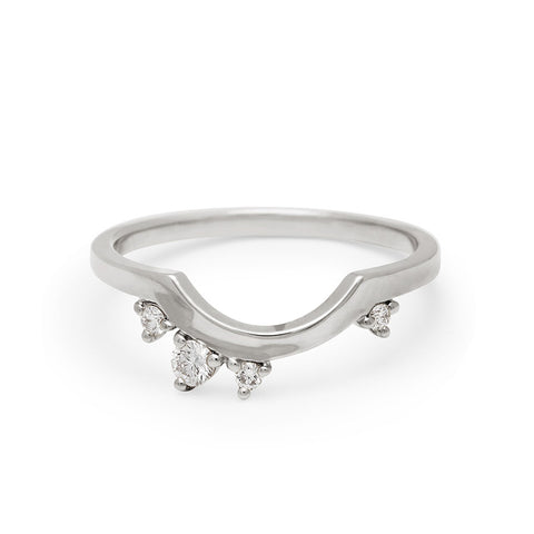 A solid gold band with asymetrical white diamond accent stones set in white gold., White Gold 5
