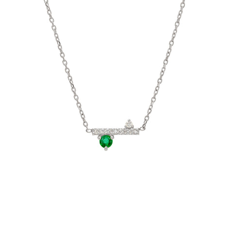 A straight line of white diamond pave with emerald accent stones on either side set in a white gold necklace chain., White Gold 3
