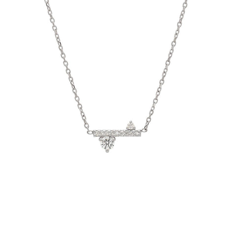 A straight line of white diamond pave with white diamond accent stones on either side set in a white gold necklace chain., White Gold 4