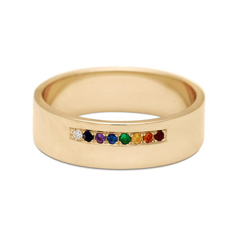 A 5mm flat band with a line of rainbow colored stones set in yellow gold., Yellow Gold