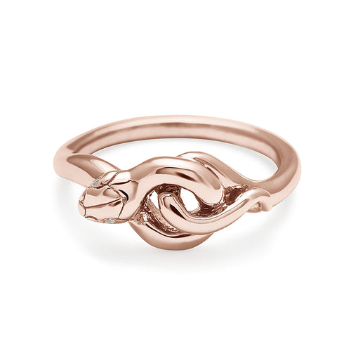 A serpent band with white diamonds for eyes set in rose gold., Rose Gold