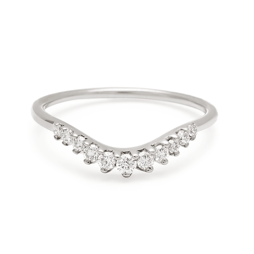A curved 11 white diamond band set in white gold., White Gold