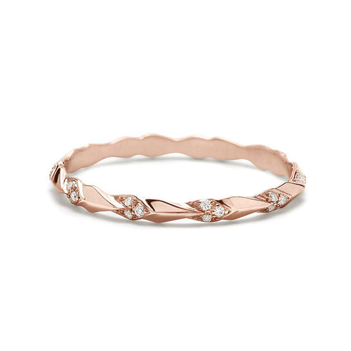 A tiny straight band with leaf like definition with white diamond accent stones set in rose gold., Rose Gold