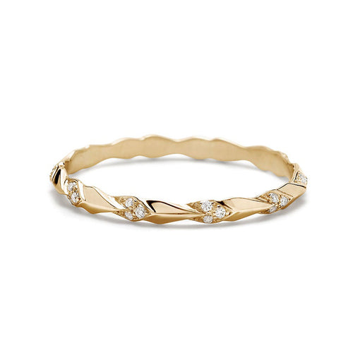 A tiny straight band with leaf like definition with white diamond accent stones set in yellow gold., Yellow Gold