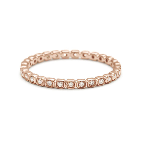 A straight band with tiny white diamonds set in eternity around the band set in rose gold., Rose Gold 2