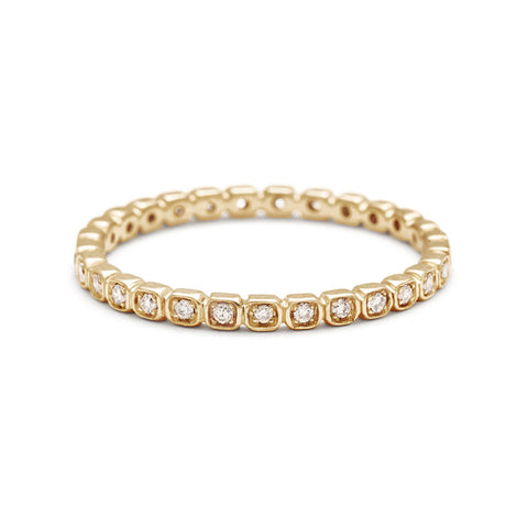 A straight band with tiny white diamonds set in eternity around the band set in yellow gold., Yellow Gold