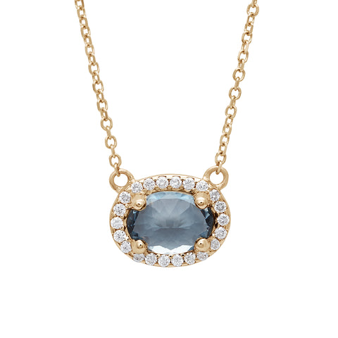A necklace with an oval shape grey spinel center stone surrounded by a white diamond pave halo set in yellow gold on a yellow gold chain., Yellow Gold