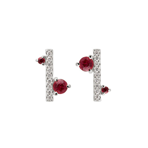 A pair of straight line of white diamond pave with ruby accent stones on either side earrings set in white gold., White Gold 4