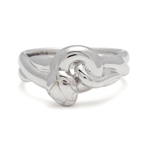 A large serpent band with white diamonds for eyes set in white gold., White Gold 5