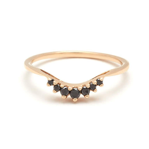 A curved band with 7 black diamonds in ascending and descending size set in yellow gold., Yellow Gold 5