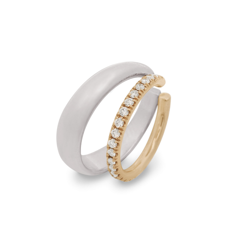 A double hoop earring cuff featuring a sterling silver hoop and a yellow gold hoop with white diamonds on a white background