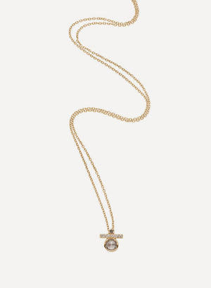 A 14k yellow gold chain necklace with a pear shaped charm. The pear charm is made of multiple colors of diamonds.