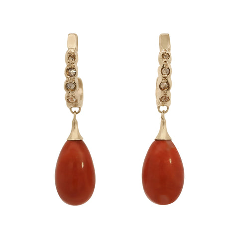 Coral drop earrings featuring champagne diamonds set in yellow gold.