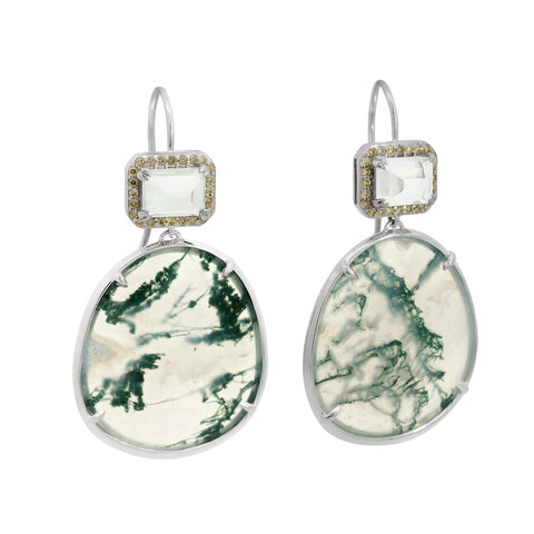 Pair of silver drop earrings with green and white marbled stones on a white background