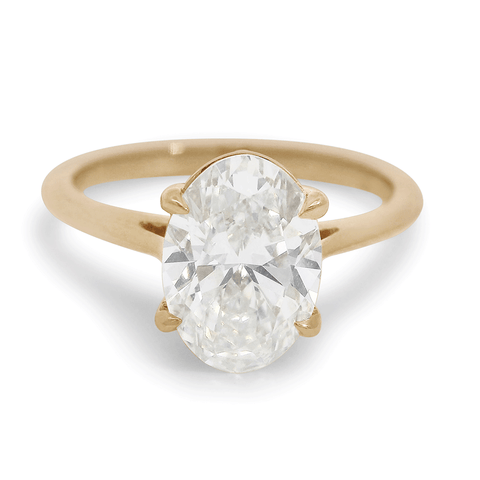 A solitaire ring north/south oval white diamond set in yellow gold., Yellow Gold