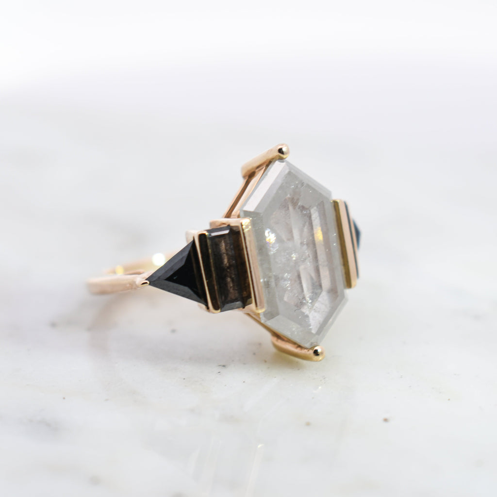 Side view of grey diamond hex theda ring