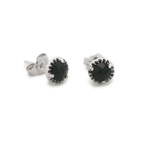 Pair of silver stud earrings with black gemstones on a white background 2