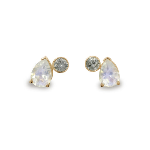 Gold earrings with teardrop-shaped rainbow moonstone gemstones and round grey diamonds on a white background