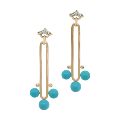A pair of yellow gold drop earrings featuring a grey diamond arc detail at the top and three turquoise cabochons at the bottom with a small grey diamond detail on a white background