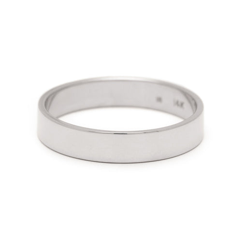 A 4mm flat band set in white gold. 10