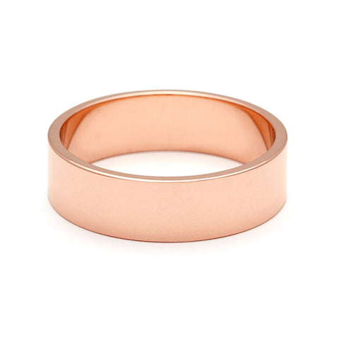 A 5mm flat band set in rose gold. 7