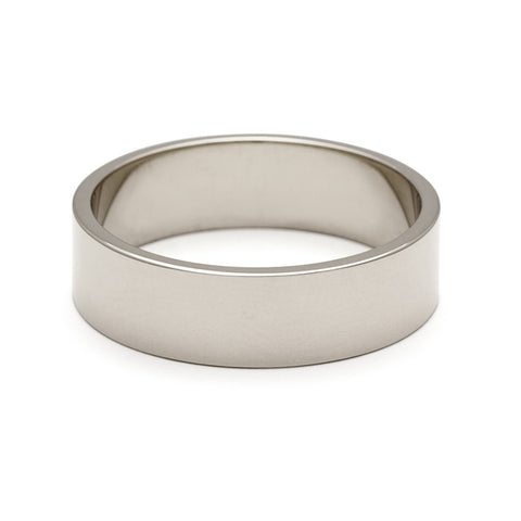 A 5mm flat band set in white gold. 3