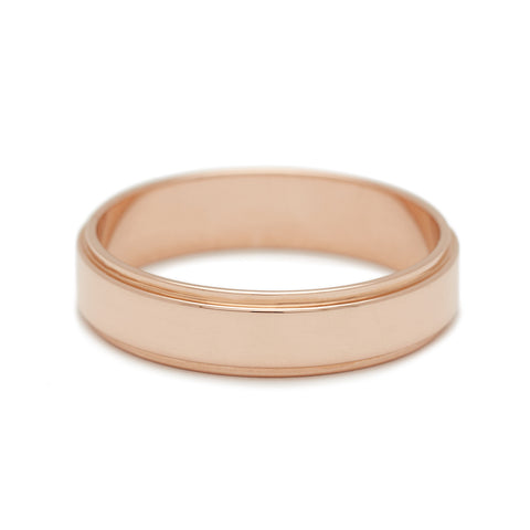 A 4mm flat edge band in rose gold 6