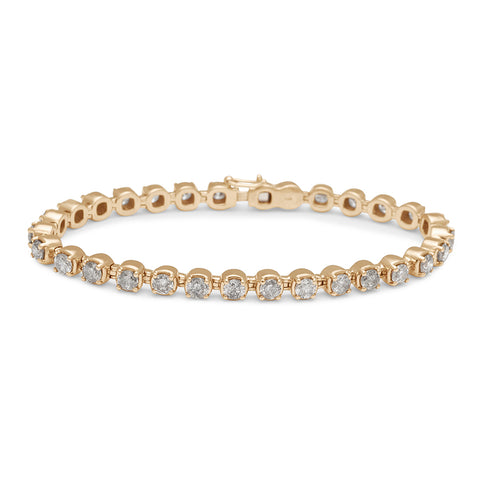 A line bracelet with grey diamonds set in eternity in yellow gold.