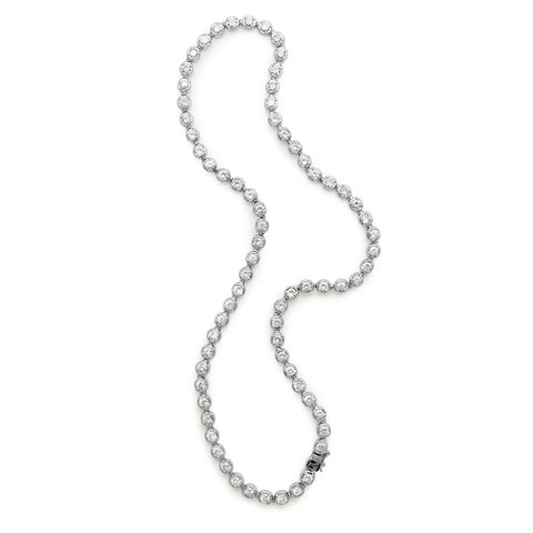 A swirled line necklace with lab white diamonds set in eternity in white gold.