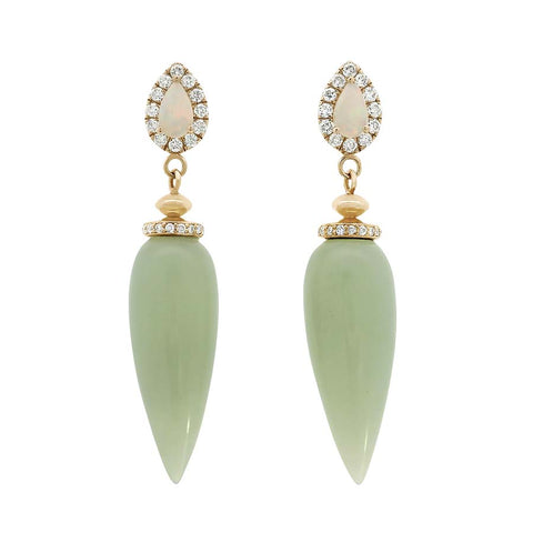 A pair of serpentine drop earrings with a white diamond halo at the top and a pear fire opal set in yellow gold.