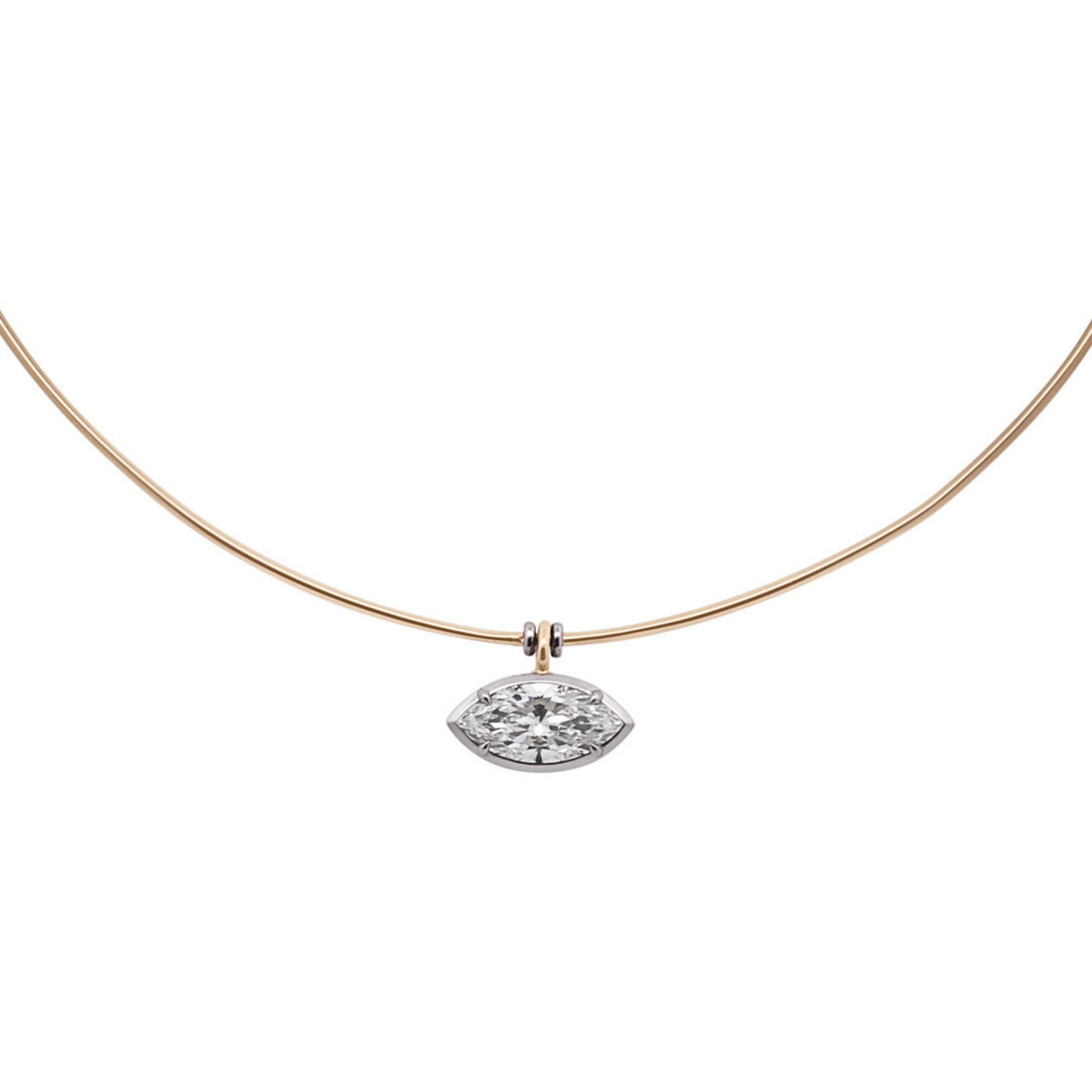 A marquise white diamond set in platinum on a yellow gold torque necklace on a white background 