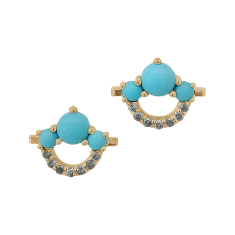 A pair of gold stud earrings featuring three turquoise cabochons and grey diamonds on a white background