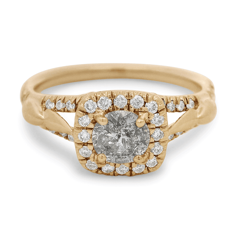 A sheaves bauble ring with a round grey diamond set in 14k yellow gold.